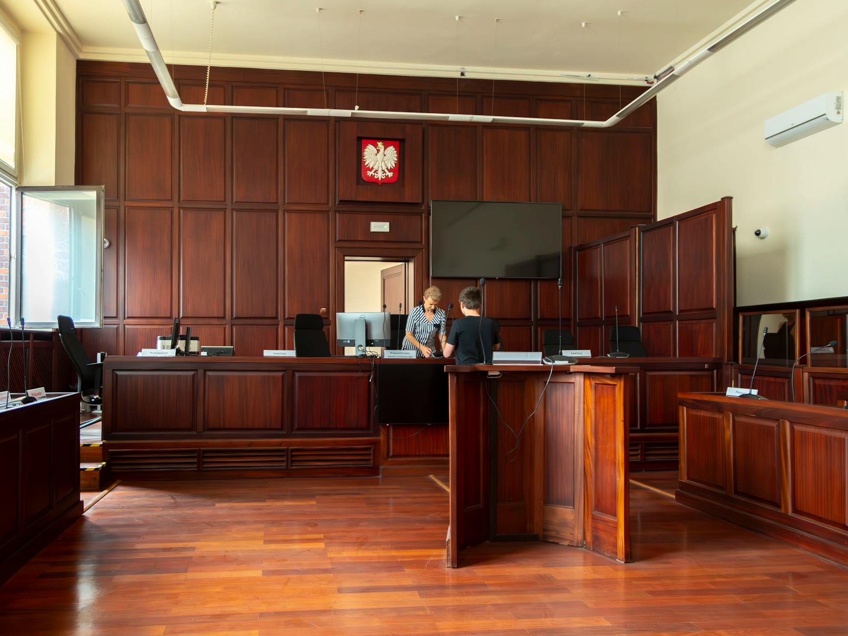ASL Interpreters in Courtroom Settings—Specific Procedures and Challenges