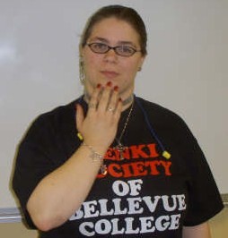 ASL sign for color, first position
