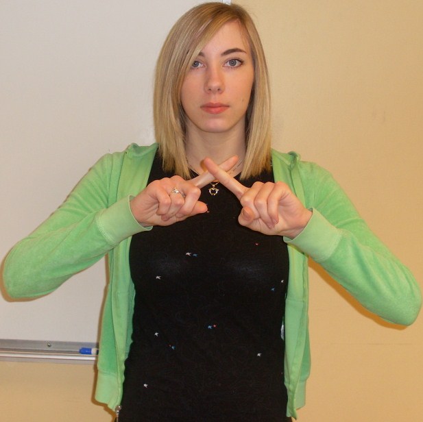 ASL sign for different, first position