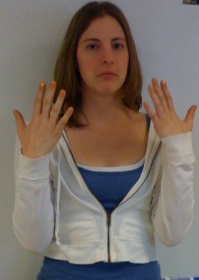 ASL sign for sad, second position