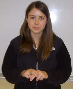 ASL sign for sit, first position